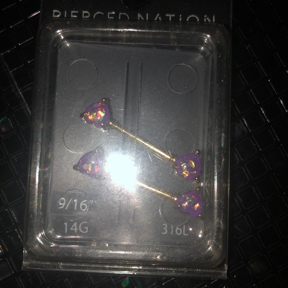 Purple and gold opal nipple piercing
